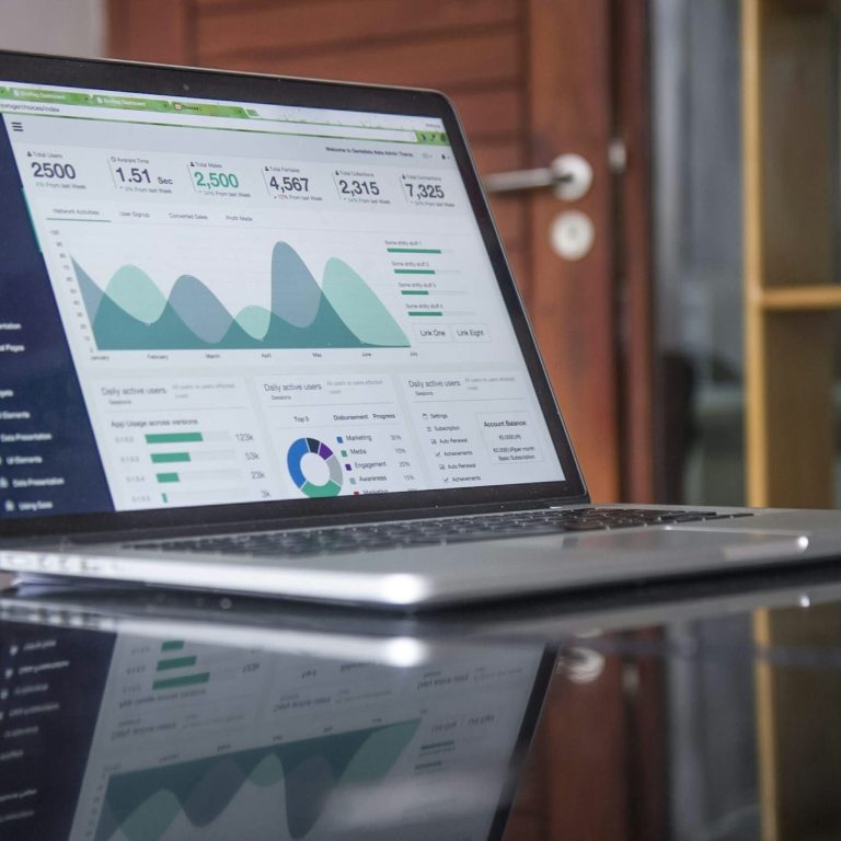 Laptop screen with data and analytics